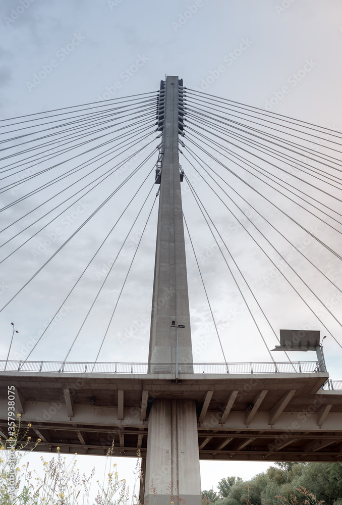 Bridge with cables. Swietokrzyski bridge in Warsaw over the Vistula. Foreshortening from below.