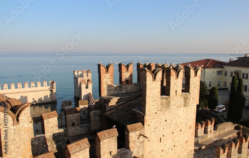 Curtain walls in the Scaligero castle overlooking the Lake Garda in Sirmione, Italy.