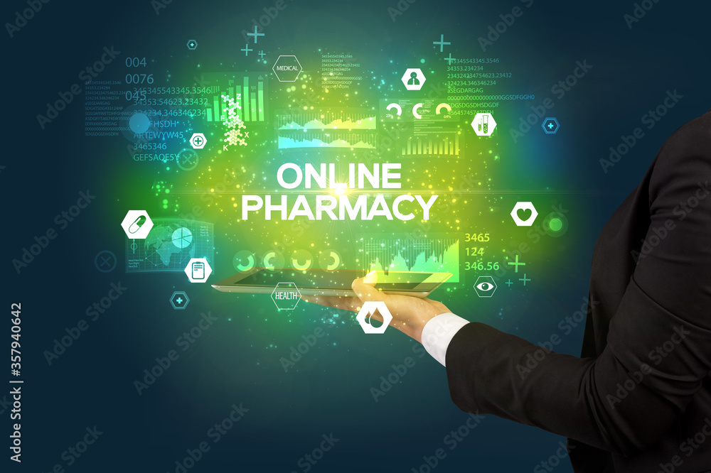 Close-up of a touchscreen with ONLINE PHARMACY inscription, medical concept Close-up of a touchscreen with ONLINE PHARMACY inscription, medical concept
