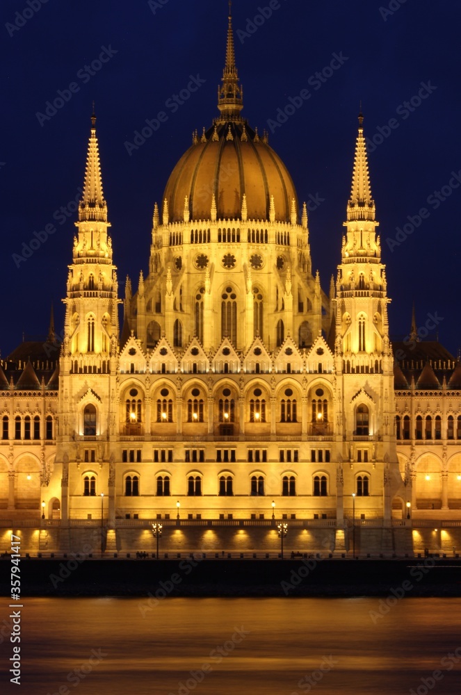 Parliament building of Budapest above Danube river in Hungary at night