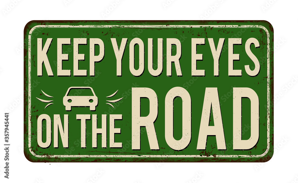 Keep your eyes on the road vintage rusty metal sign