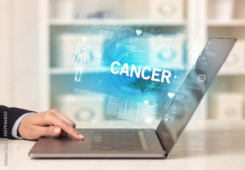 Doctor working a health check with CANCER inscription, recording medical test results Doctor working a health check with CANCER inscription, recording medical test results