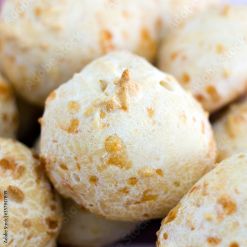Brazilian cheese bread (pao de queijo), a typical specialty made of cheese, cassava starch, milk, eggs and oil, mixed all together and baked forms a delicious crusty shell with soft springy center