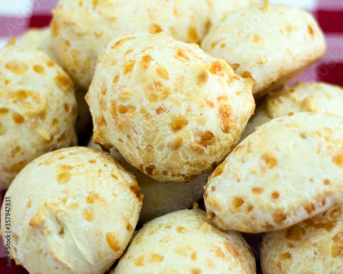 Brazilian cheese bread (pao de queijo), a typical specialty made of cheese, cassava starch, milk, eggs and oil, mixed all together and baked forms a delicious crusty shell with soft springy center