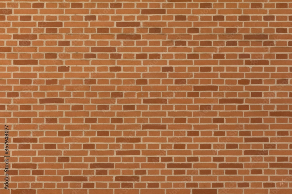 Stable stone wall with many rows of crafted masonry stones. Brickwork with individual craft bricks pattern. Strong manual work construction build has stability. Nice creativity vintage pattern Stable stone wall with many rows of crafted masonry stones. Brickwork with individual craft bricks pattern. Strong manual work construction build has stability. Nice creativity vintage pattern