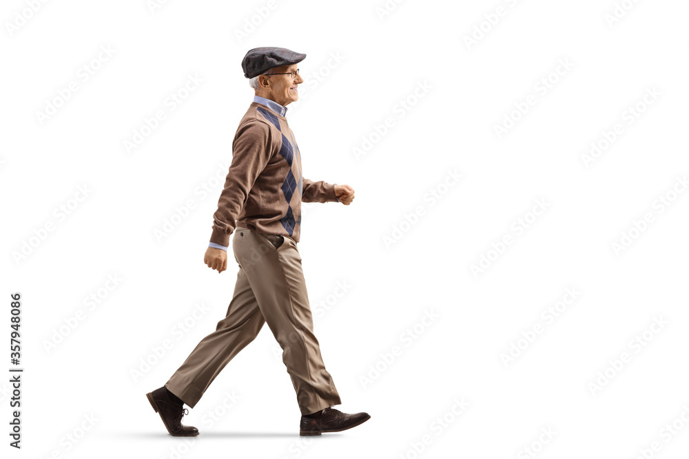 Full length profile shot of an elderly man walking fast Full length profile shot of an elderly man walking fast