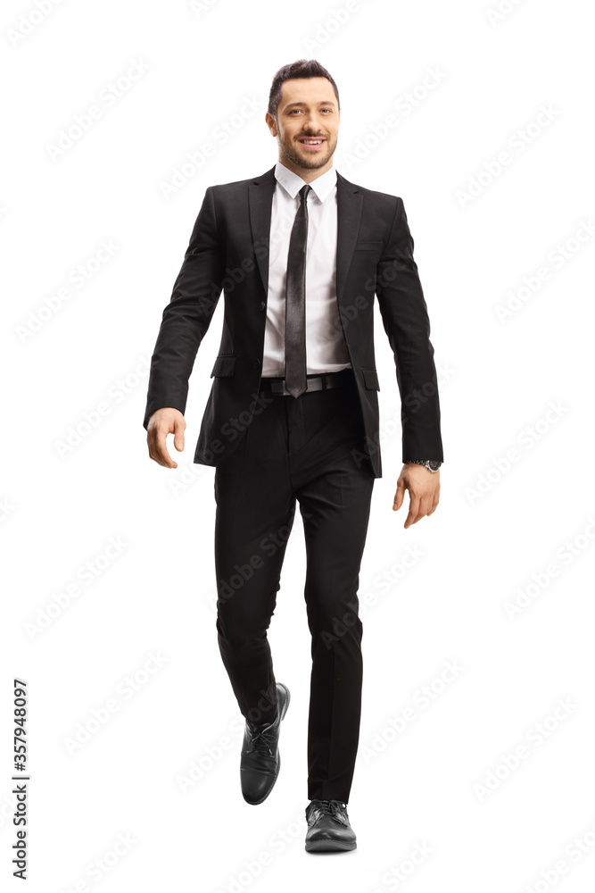 Businessman walking towards camera Businessman walking towards camera