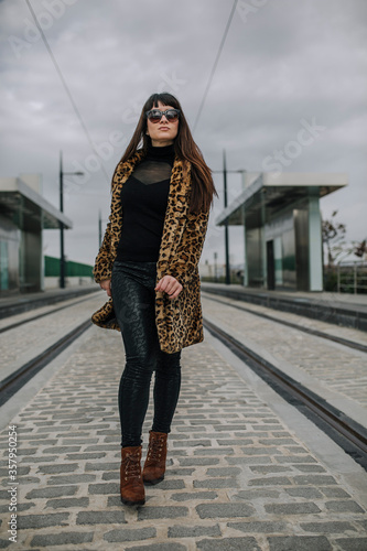 Woman in leopard coat beauty
