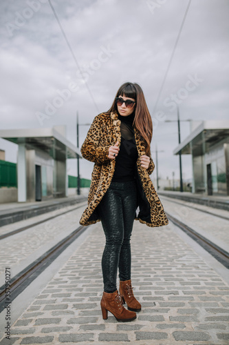Woman in leopard coat beauty