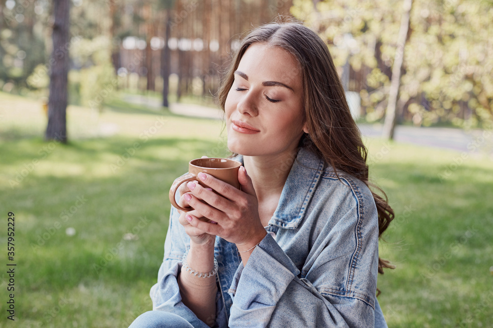 Peaceful lady enjoying pleasant morning in forest Peaceful lady enjoying pleasant morning in forest