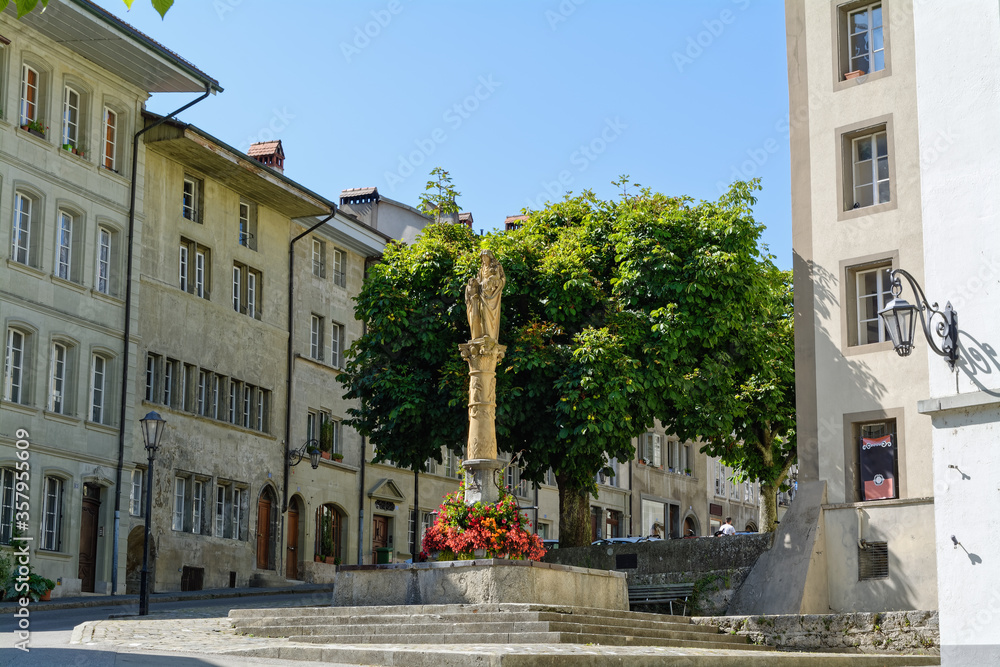Beautiful Gothic St. Anne Fountain in old town of Fribourg, Switzerland
