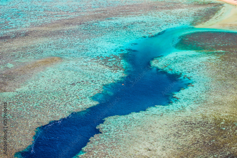 Rarotonga breathtaking stunning views from a plane of beautiful beaches, white sand, clear turquoise water, blue lagoons, Cook islands, Pacific islands