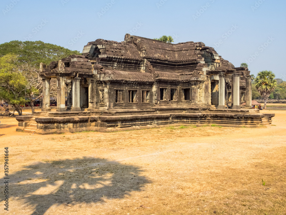The shadow of a palm tree and the South Library of Angkor Wat - Siem Reap, Cambodia