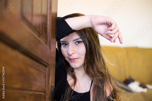 young woman on the door