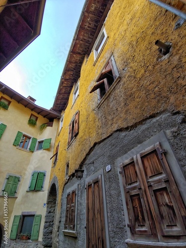 Low angle shot of an old apartment with many windows photo