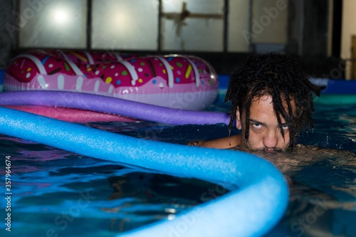 young man in the pool