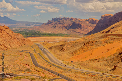 View of the entrance to Arches canyon and moab in the distance