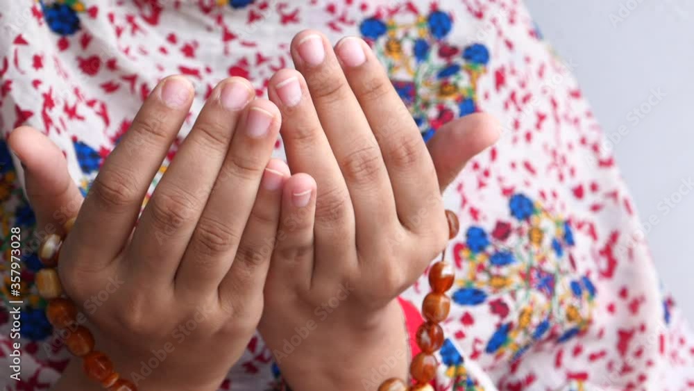 Close up of of muslim women hands praying Close up of of muslim women hands praying