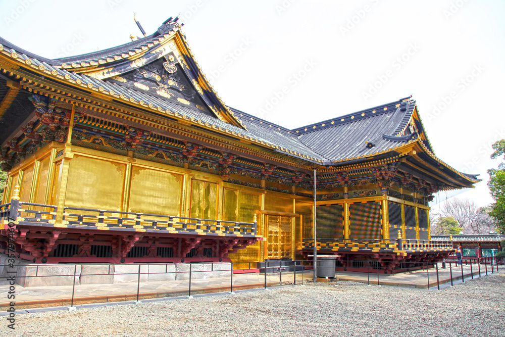 The Ueno Toshugu Shrine is located in Ueno Park in Tokyo, Japan and is brightly gold in colour. The Ueno Toshugu Shrine is located in Ueno Park in Tokyo, Japan and is brightly gold in colour.