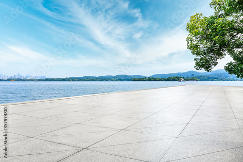 Empty square floor and West Lake scenery in Hangzhou,China. © ABCDstock