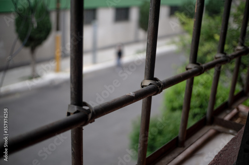 window seeing freedom through bars, stay at home
