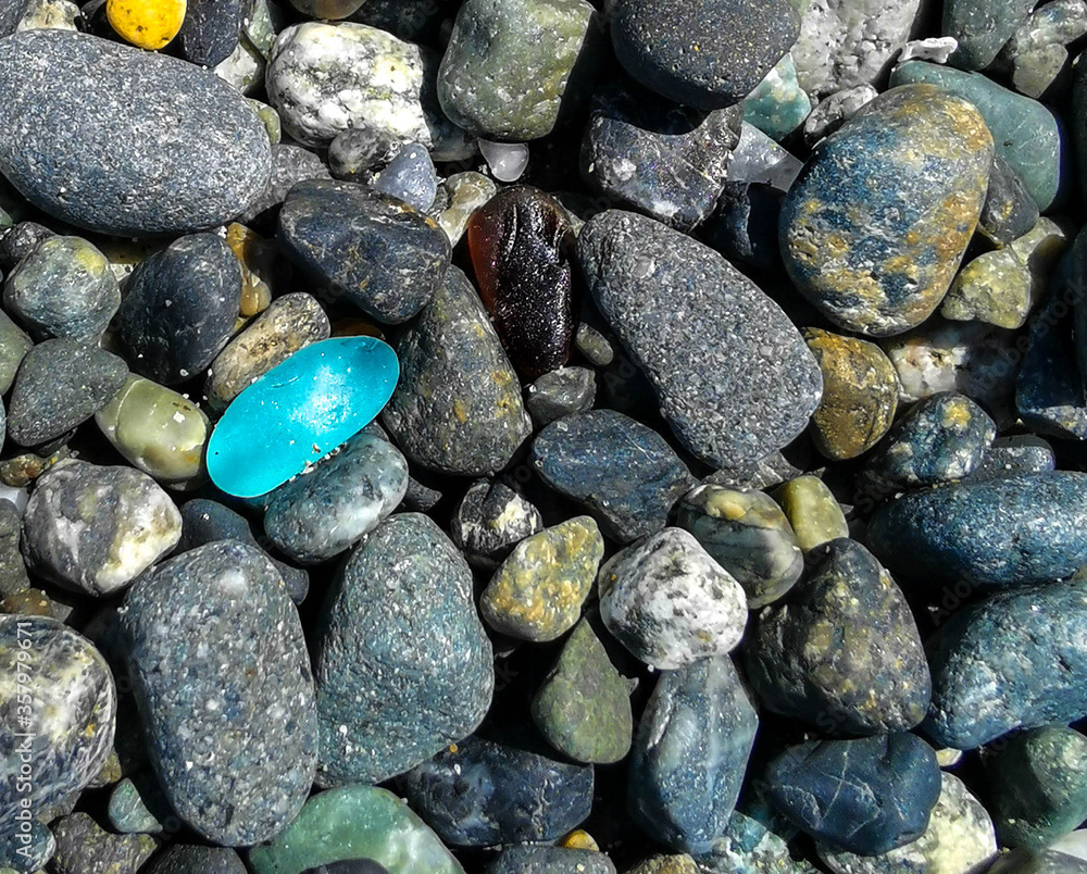 Sea Glass On Ocean Beach with Stones Rocks Sea Glass On Ocean Beach with Stones Rocks