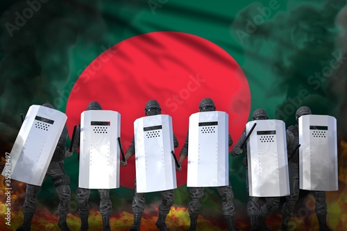 Wallpaper Mural Bangladesh police guards in heavy smoke and fire protecting country against mutiny - protest fighting concept, military 3D Illustration on flag background Torontodigital.ca