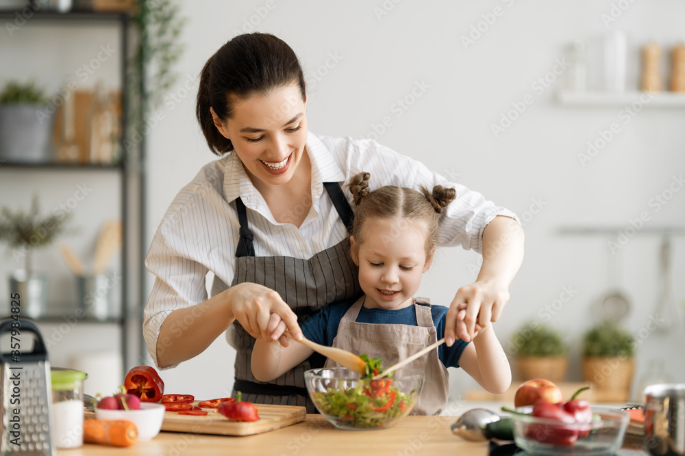 Happy family in the kitchen.