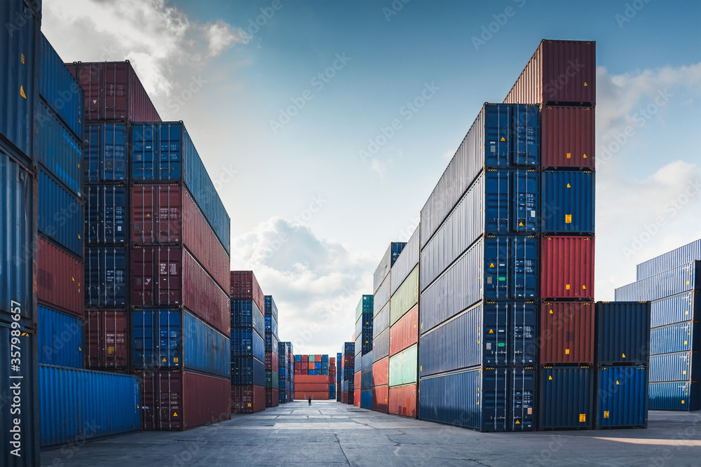 Container Cargo Port Ship Yard Storage Handling of Logistic Transportation Industry. Row of Stacking Containers of Freight Import/Export Distribution Warehouse. Shipping Logistics Transport Industrial - obrazy, fototapety, plakaty 