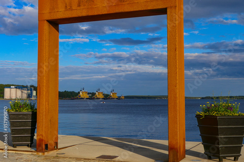 Lulea, Sweden An archway at the South Harbour, or Sodra hamnplan, on a summer evening. photo