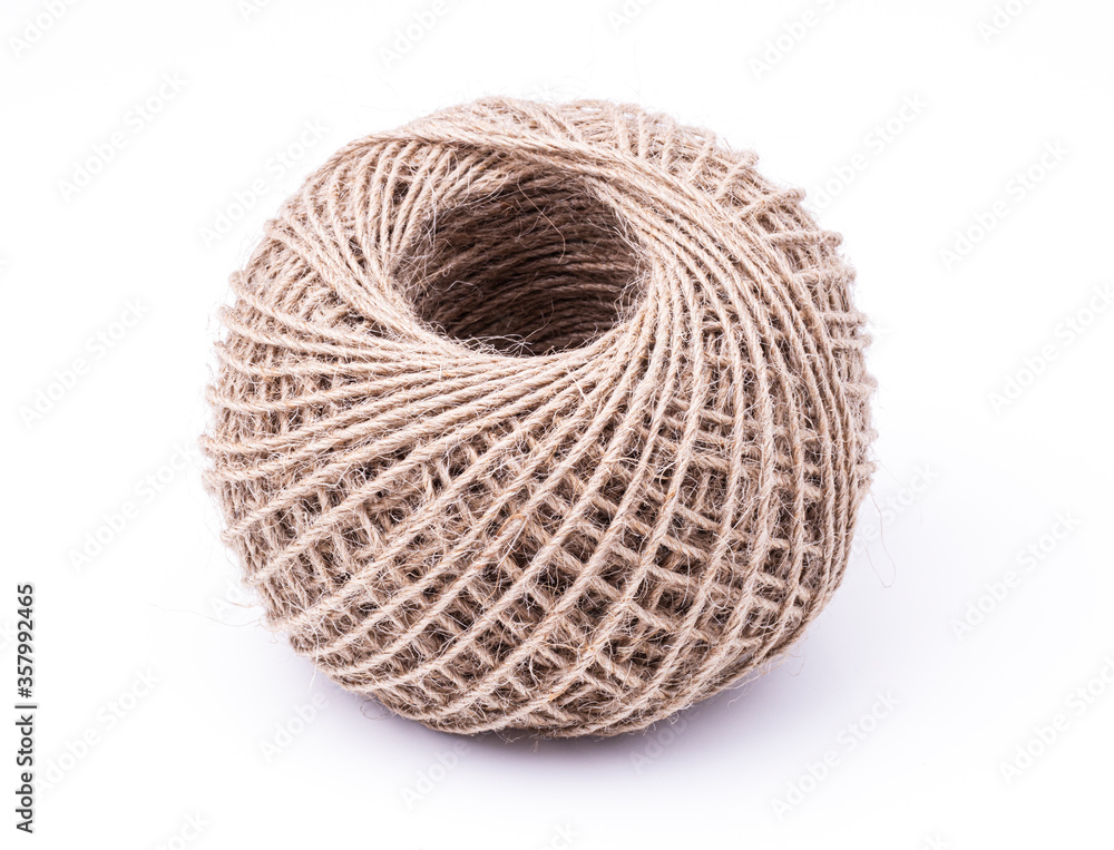 rope made of environmentally friendly material rolled into a ball with the end isolated on a white background rope made of environmentally friendly material rolled into a ball with the end isolated on a white background