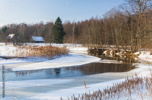 river in winter with ice and snow
