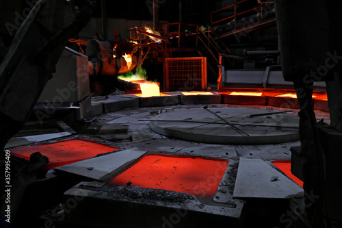 Fototapeta View of the copper casting to the molds in the smelting of the industrial plant