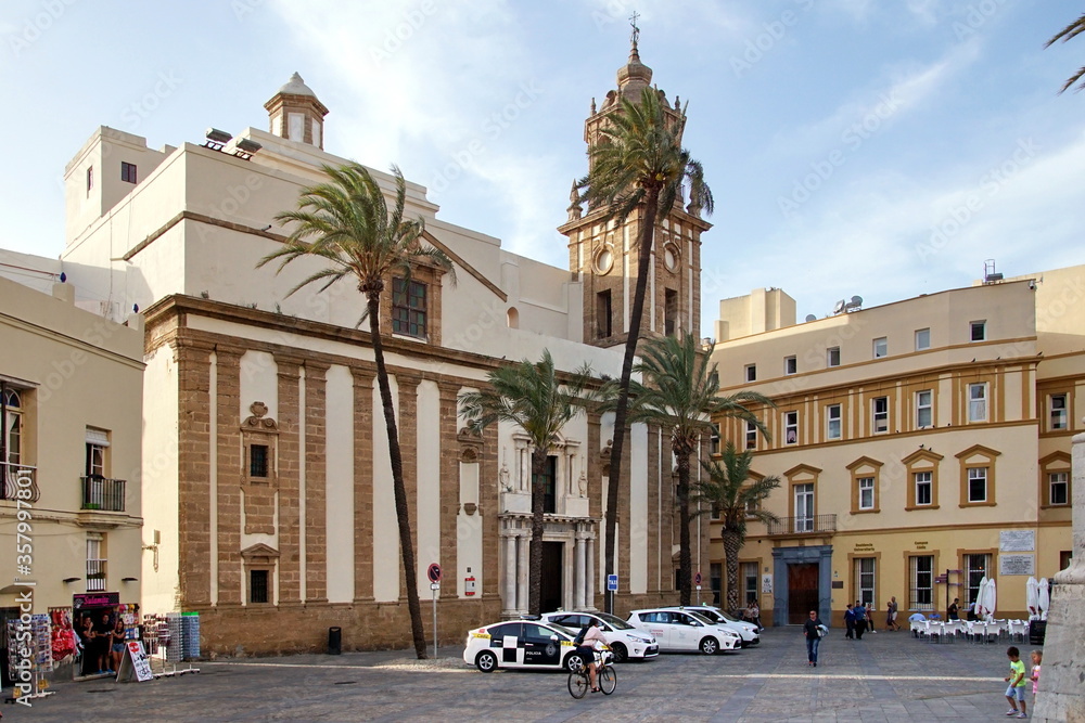 Principal facade of the Iglesia de Santiago Church in Plaza de la Catedral square. Cadiz. Andalusia, Spain.