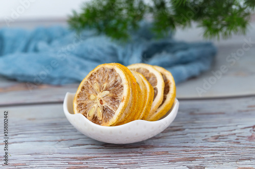 Tableau sur toile Tangy and tasteful slices of dehydrated lemon.