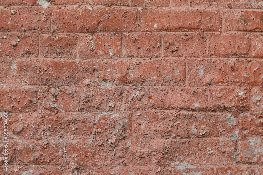 Naklejka premium brick wall Old solid brick wall with sun shadow background. texture for background