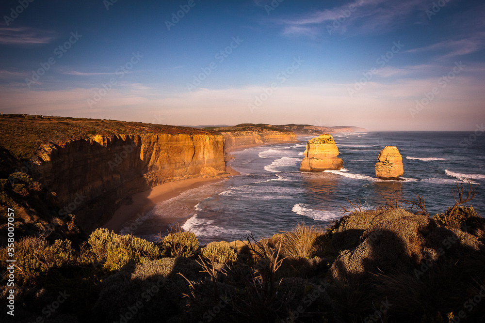 Gibson Steps, Great Ocean Road, Victoria, Australia. Cliffs and vegetation on beautiful destination. Golden hour colors and ocean view.