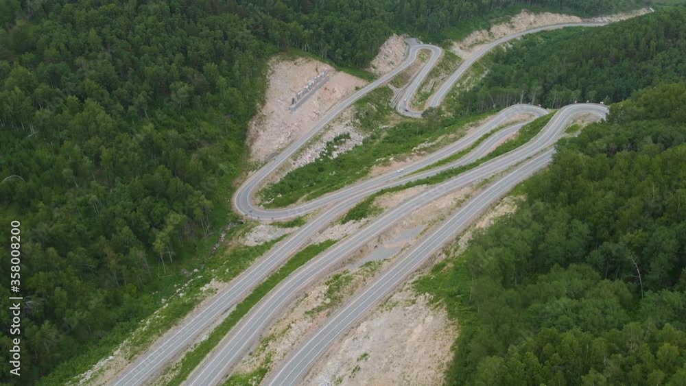 Aerial 4k drone video of top vew of winding road in the mountains, Altai Krai, Western Siberia, Russia. Road to Resort town Belokurikha 2 Aerial 4k drone video of top vew of winding road in the mountains, Altai Krai, Western Siberia, Russia. Road to Resort town Belokurikha 2