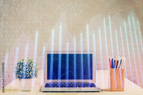 Double exposure of forex chart and work space with computer. Concept of international online trading. © peshkova
