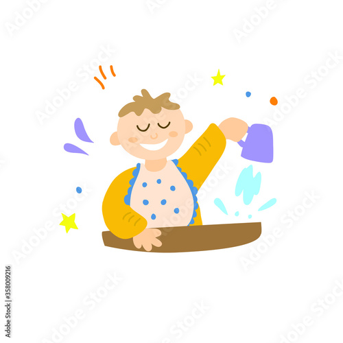 A baby pours water from a mug. Game skills training. Games at the table while eating.