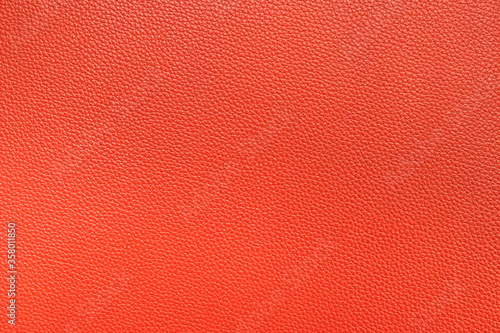Natural red leather texture, useful as a background. Color luxury fabric with pattern rough cloth surface. Weathered antique grain animal. © Chaiyaphruek