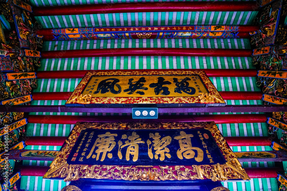 Fototapeta premium Nghia An Temple (Hoi Quan Nghia An - Chua Ong), one of Chinese Pagoda, one of the oldest temples in Saigon, Vietnam, Asia.