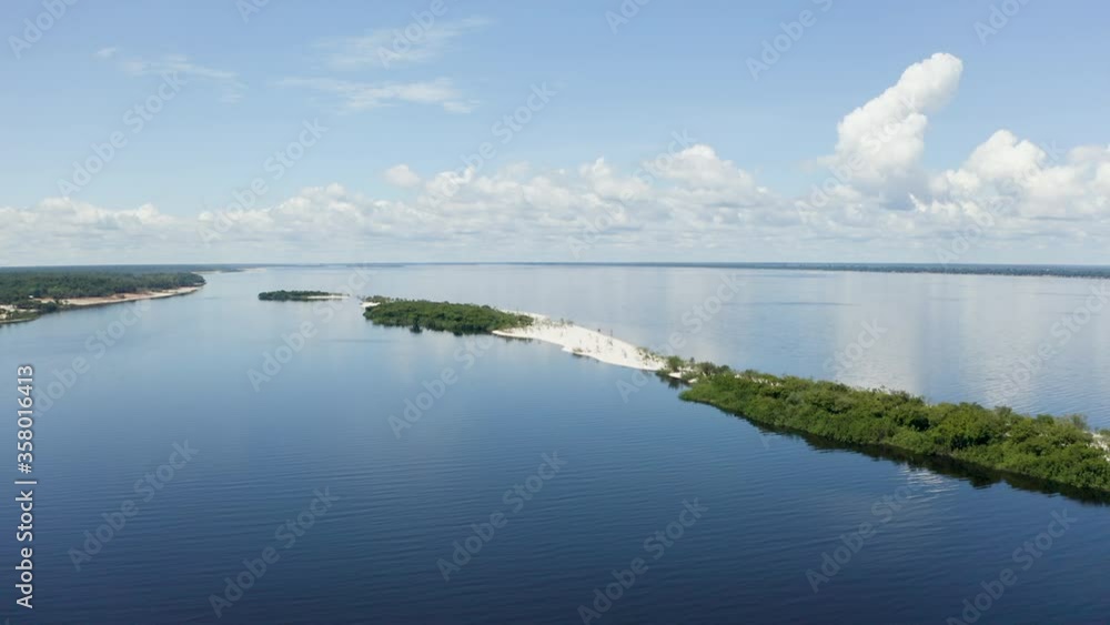 AERIAL: island in Anavilhanas National Park, the biggest fluvial archipelago of the world, at Rio Negro, Amazonia Forest. Novo Airão - Amazonas, Brazil. AERIAL: island in Anavilhanas National Park, the biggest fluvial archipelago of the world, at Rio Negro, Amazonia Forest. Novo Airão - Amazonas, Brazil.
