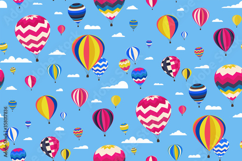 Colorful seamless pattern with Different Hot Air Balloons and clouds in the blue Sky. Hand Drawn Vector illustration. Creative design.