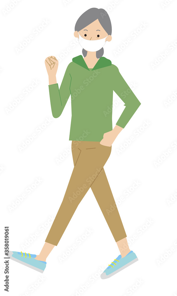 Woman wearing a mask and walking Woman wearing a mask and walking