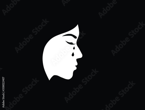Silhouette of crying woman face on black background. Sadness and depression, broken heart feeling concept