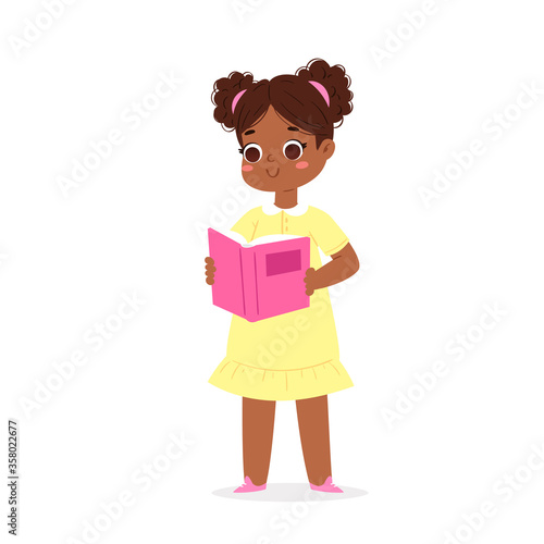 Cartoon reading kid standing with book on her hands. African smiling girl loving to read books, enjoying literature and study. Cute little smart pupil isolated on white background vector illustration