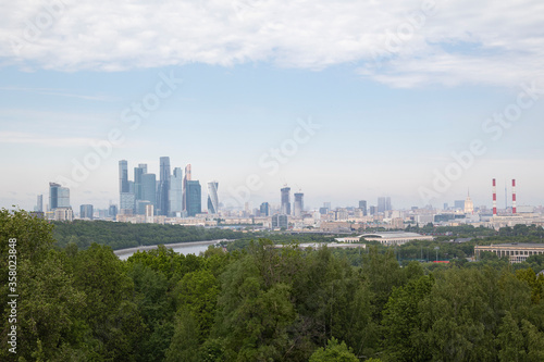 panoramic view of a business district with modern skyscrapers in summer on a sunny day
