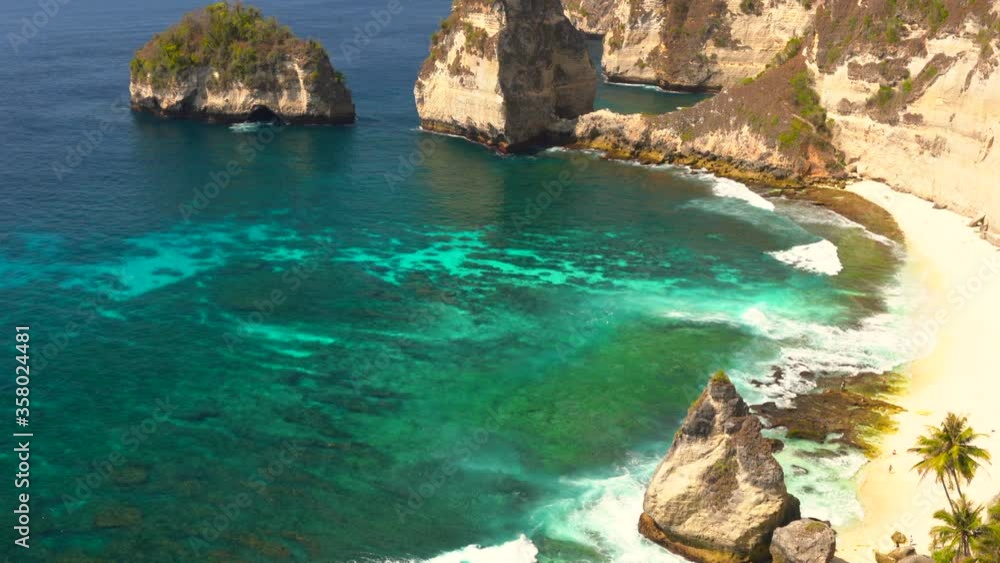 Diamond Beach – Most Beautiful Beach on Nusa Penida in Bali, Indonesia. 4K.
Amazing tropical beach with a crystal clear ocean crashing waves on the picturesque cliffs and sandy beach Diamond Beach – Most Beautiful Beach on Nusa Penida in Bali, Indonesia. 4K.
Amazing tropical beach with a crystal clear ocean crashing waves on the picturesque cliffs and sandy beach