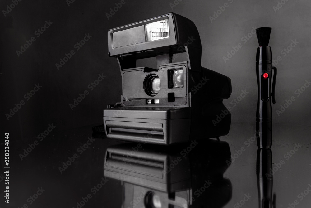 old camera on black background old camera on black background